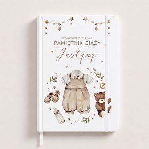 Pamiątka ciąży z delikatnym rysunkiem ubranka, misia i akcesoriów dziecięcych, napis "PAMIĘTNIK CIĄŻY".
