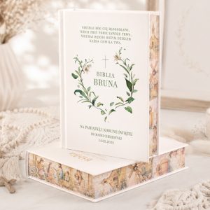 Biblia Bruna w eleganckiej oprawie, z motywem roślinnym na okładce, z napisem na pamiątkę chrztu i komunii.