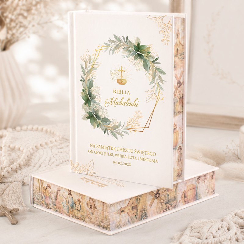 Biblia ozdobna z wiosennym motywem roślinnym, z napisem "Na pamiątkę chrztu świętego" oraz datą 04.02.2023.