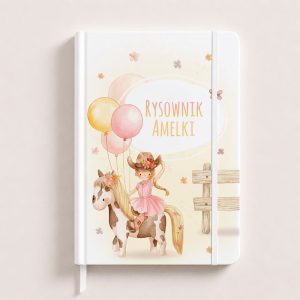 Notatnik z ilustracją dziewczynki w kapeluszu na koniu, trzymającej balony, z napisem "RYSOWNIK AMELKI".