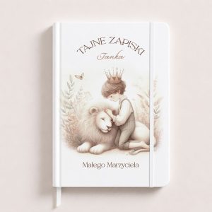 Biała okładka notatnika z ilustracją chłopca w koronie głaszczącego lwa, z napisem "Tajne Zapiski Janka" i "Małego Marzyciela".