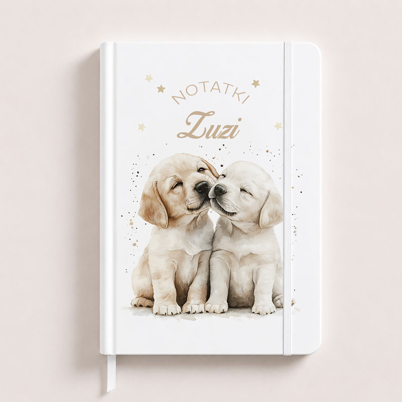 Notes notebook featuring two adorable Golden Retriever puppies nuzzling each other, with the text "NOTATKI Zuzi" above them.