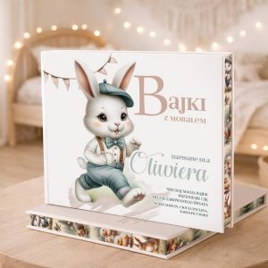 Książka dla dzieci z ilustracją uroczego królika w kapeluszu, z napisem "Bajki z morałem" i dedykacją.