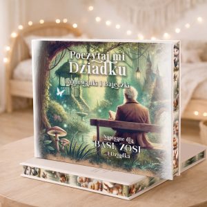 Książka z tytułem "Poczytaj mi Dziadku" pokazuje mężczyznę siedzącego na ławce w parku, otoczonego drzewami i motylami.