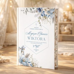 Książka ozdobna na pamiątkę pierwszej komunii świętej, z tytułem 'Magiczne Obietnice Wiktora' oraz kwiatowymi motywami na okładce. Data: 10 sierpnia 2027.