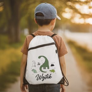 Plecak worek na sznurkach z motywem dinozaurów i imieniem dziecka.