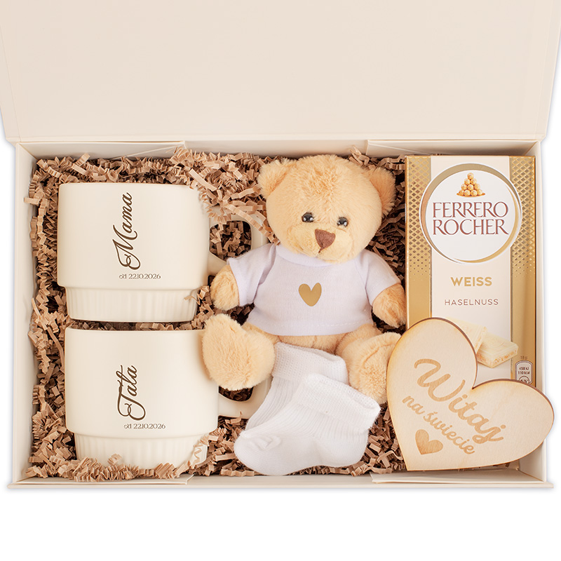 Zestaw prezentowy z dwoma kubkami, pluszowym misiem, czekoladkami Ferrero Rocher oraz serduszkiem z napisem "Witaj na świecie".