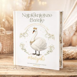 Książka z białym łabędziem w koronie na okładce, z eleganckim tytułem w języku polskim.