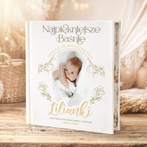 Książka z tytułem "Najpiękniejsze Baśnie" z zdjęciem małego dziecka w białej sukience, otoczona elegancką oprawą.