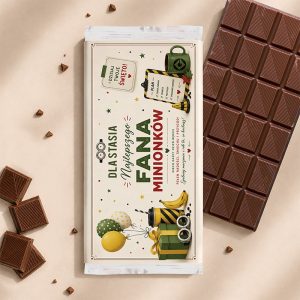 Czekolada z kolorowym opakowaniem, zawierającym motyw bananów i napisem „Dla Stasi, Najlepszego Fana Minionków”.