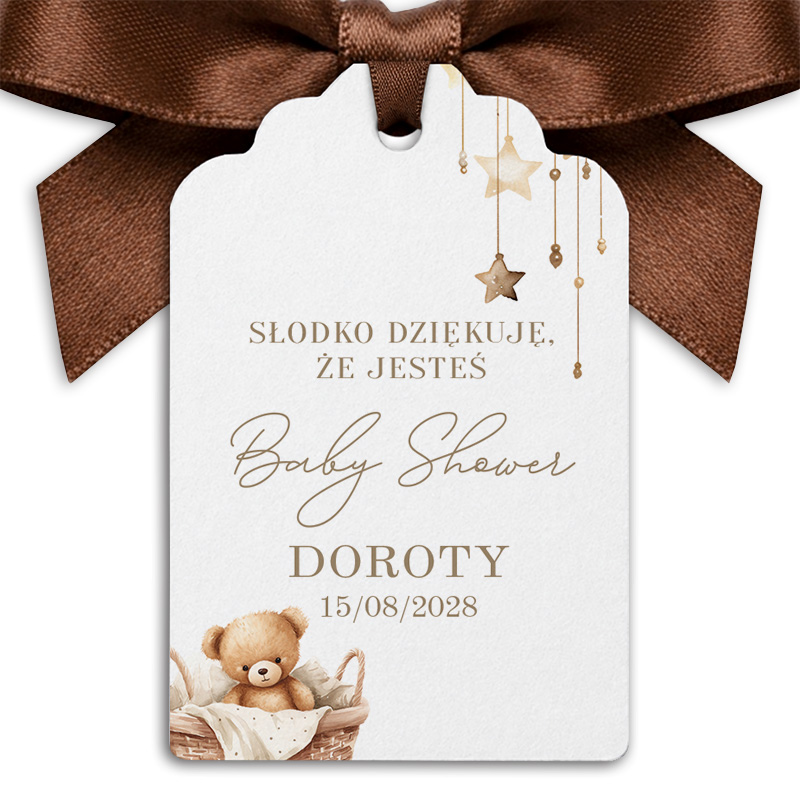 Grzechotka z jasnymi drażetkami i motywem misia jako podziękowanie na baby shower.